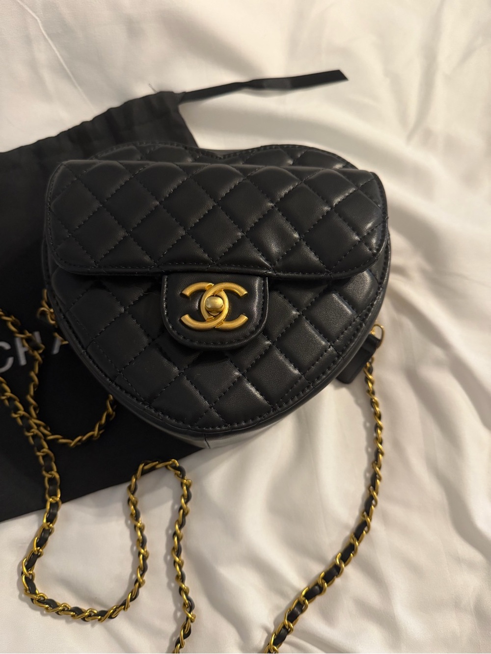 Black Quilted Heart Crossbody Bag with Gold Hardware